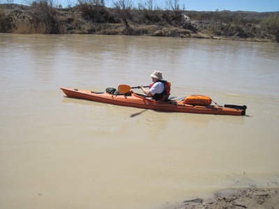 Every thing this kayaker need fit in his small kayak.